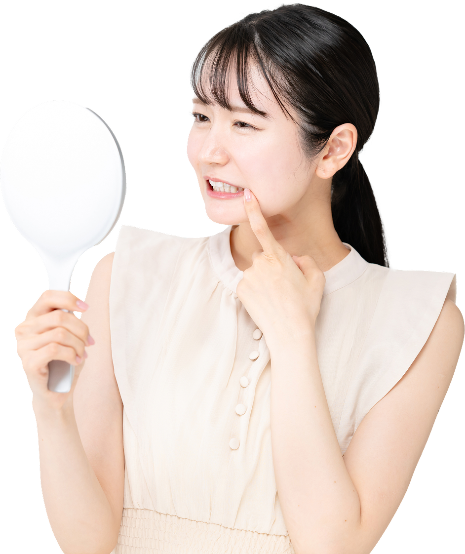 悩んでる女性の画像